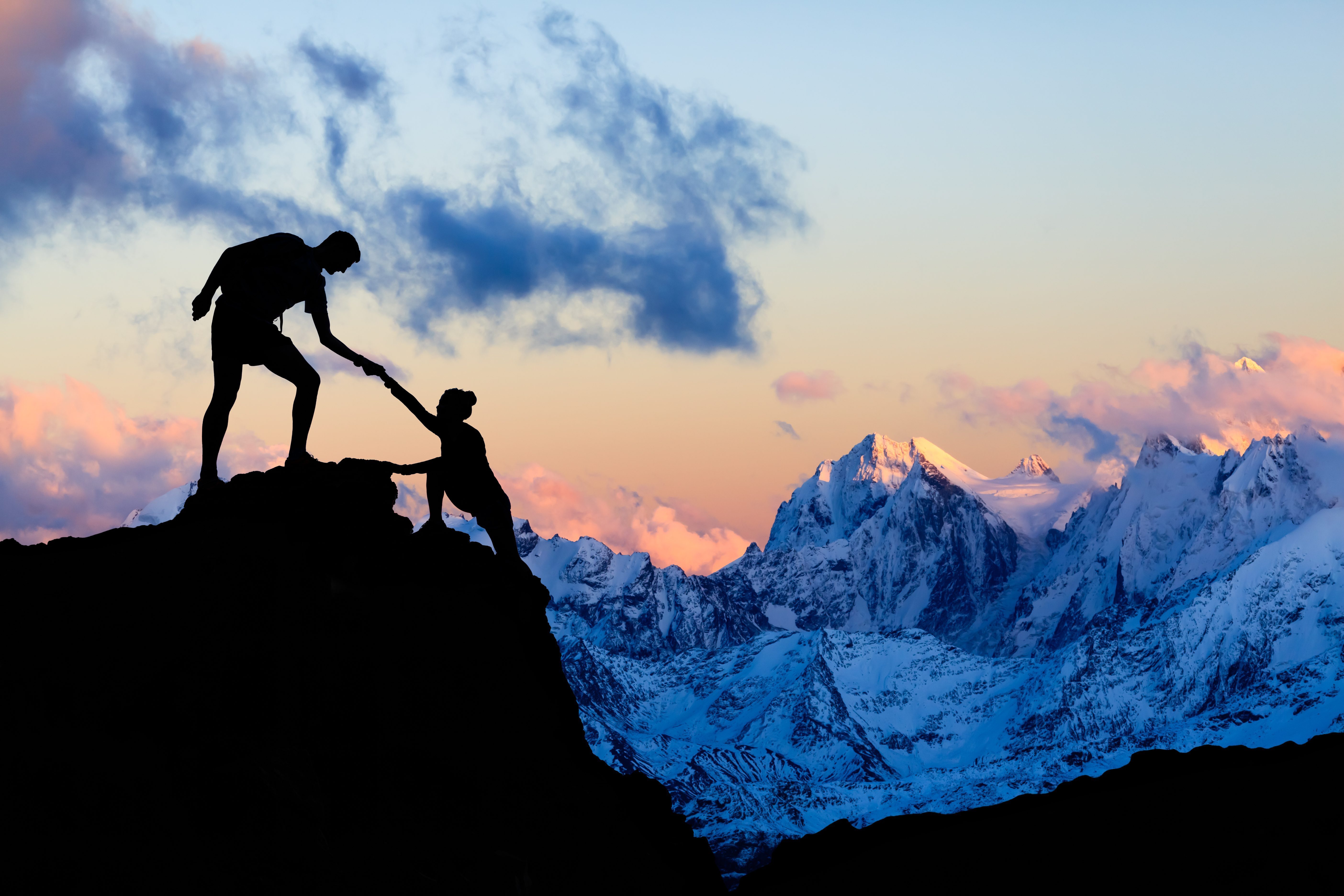 Teamwork Couple Helping Hand, Trust In Mountains. Team Of Climbe
