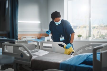 Disinfecting hospital bed cleaning nurse healthcare project firstline
